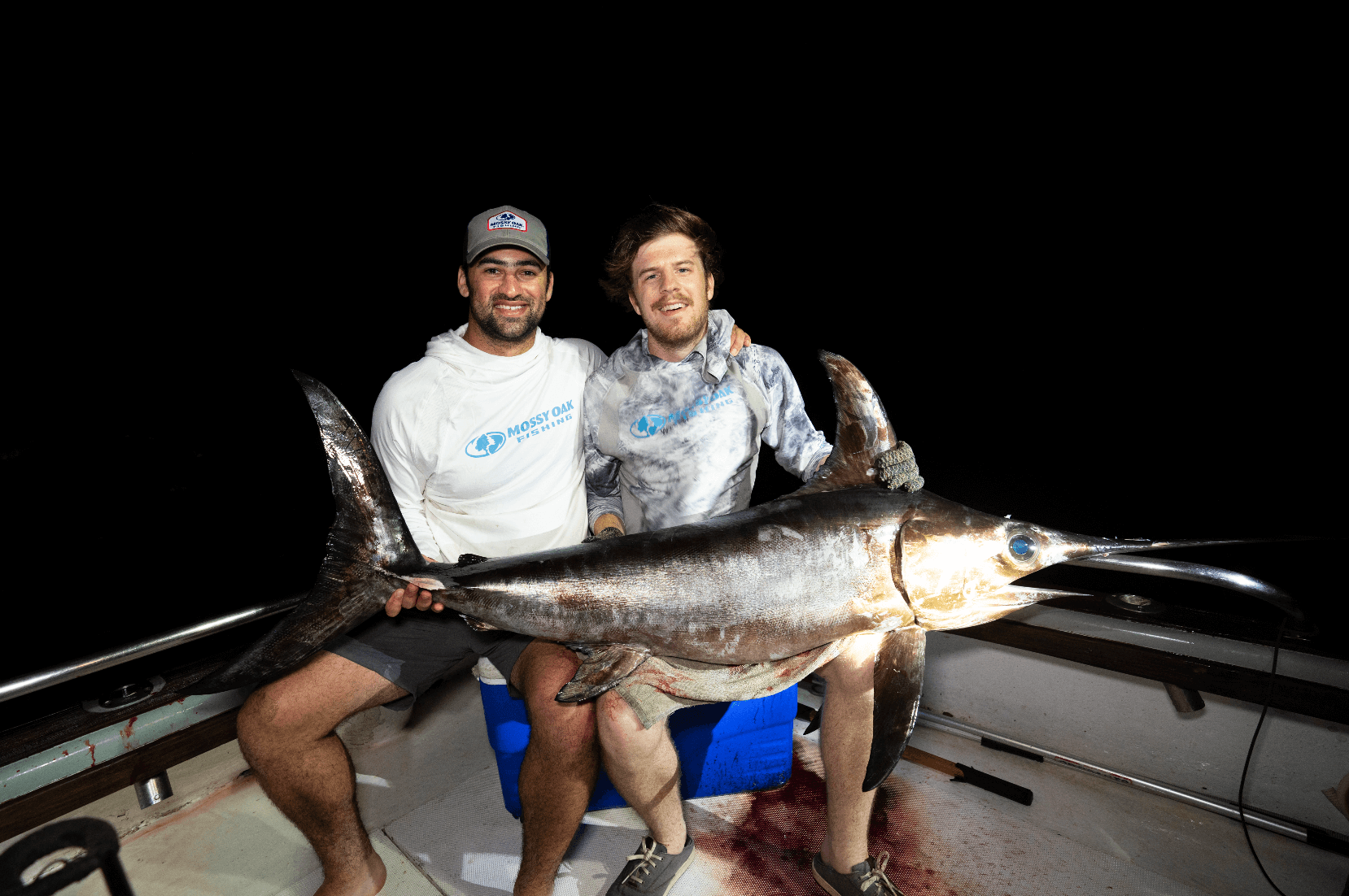 Men with tanzanian swordfish