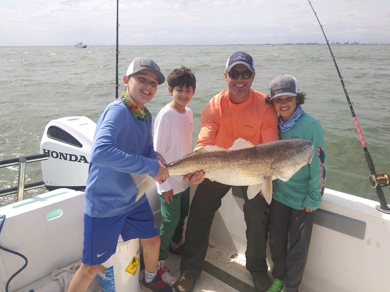 img! freeport-fishing-family-redfish