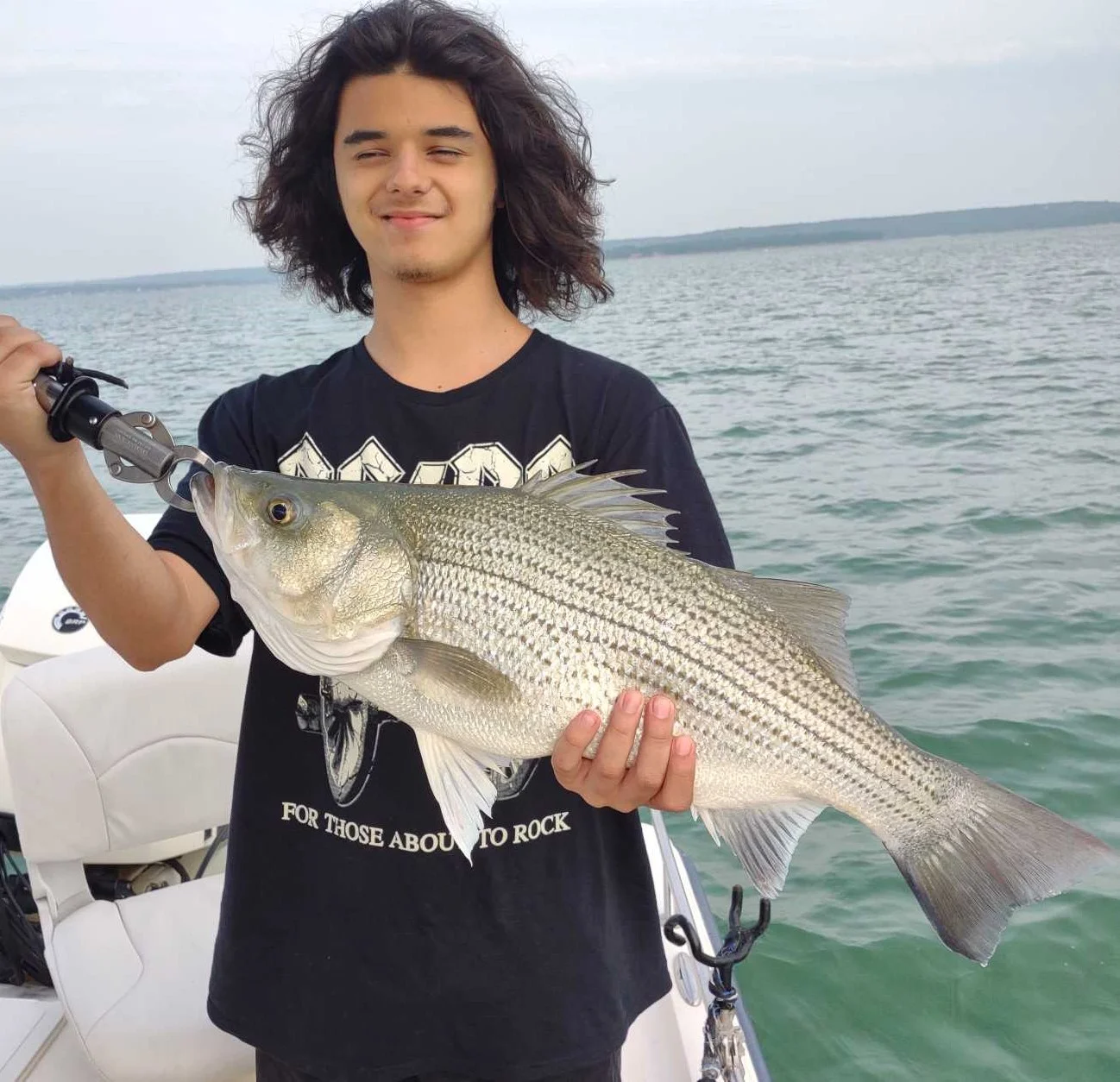 Blue Catfish, Hybrid Striped Bass Fishing in Runaway Bay, Texas